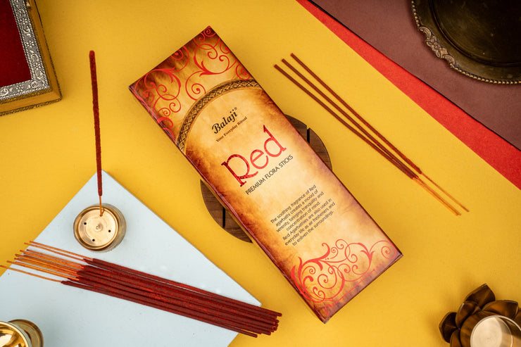 Incense stick packaging with incense sticks on a colorful background